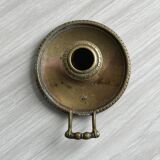 Brass candle holder with handle.