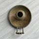Brass candle holder with handle.