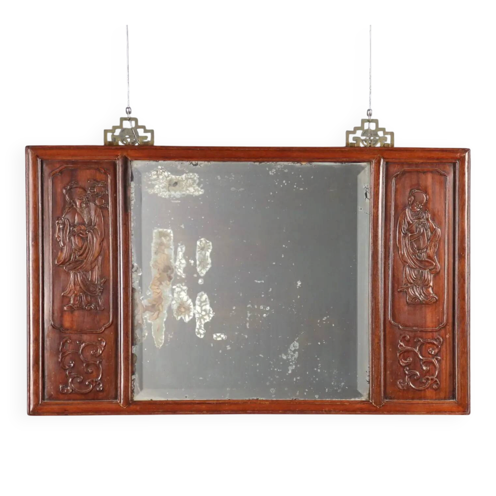 Antique mirror in exotic wood with chinoiserie carvings, 19th century.