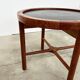 Duo of round coffee tables with a reversible top — Crossed base