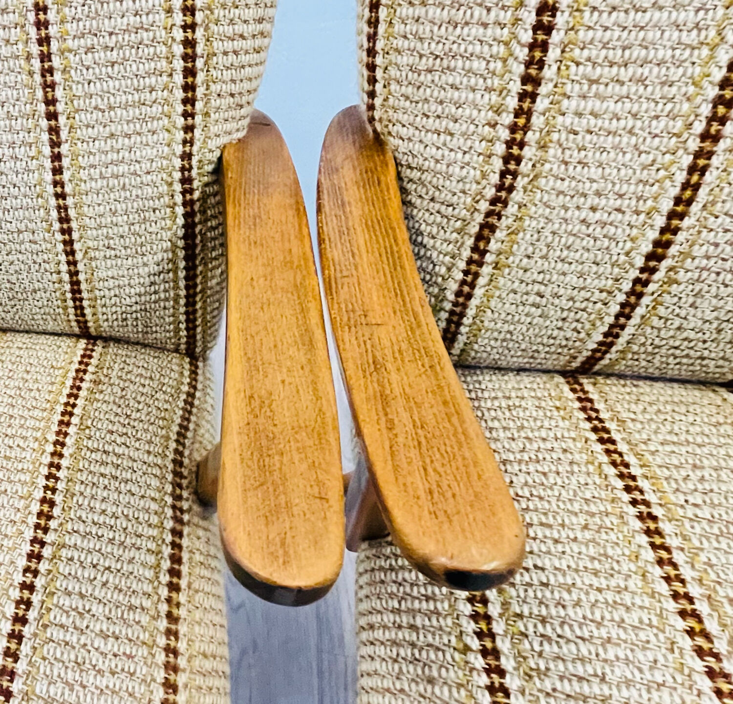 A pair vintage cocktail chairs with stripes and metal screws