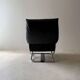 Swiss lounge chair with ottoman by Robert Haussmann from the 1980s.