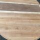 Round dining table with a central pedestal, extendable, stripped in solid walnut with 2 extensions.