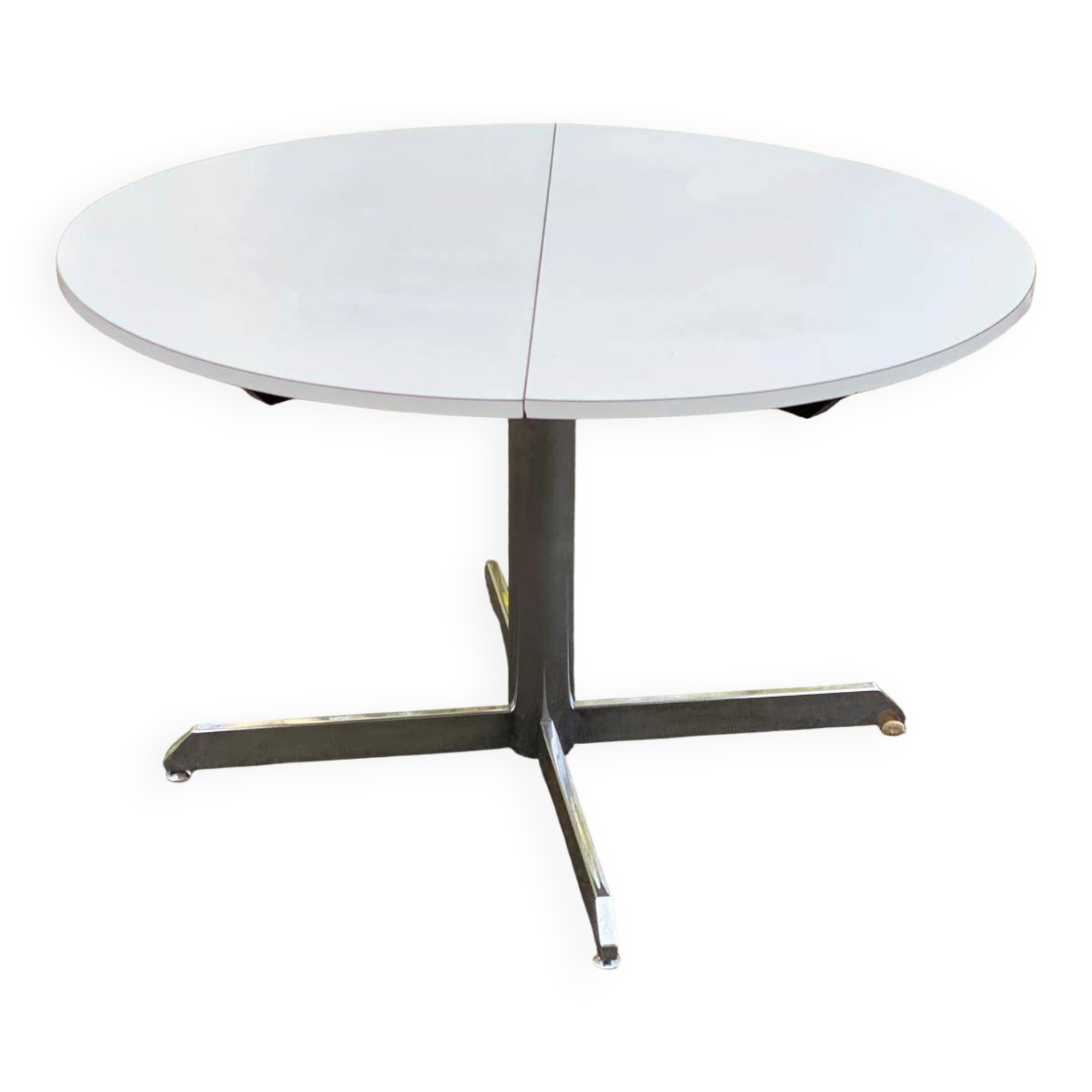 White dining table with a central pedestal, extendable, from the 1970s.