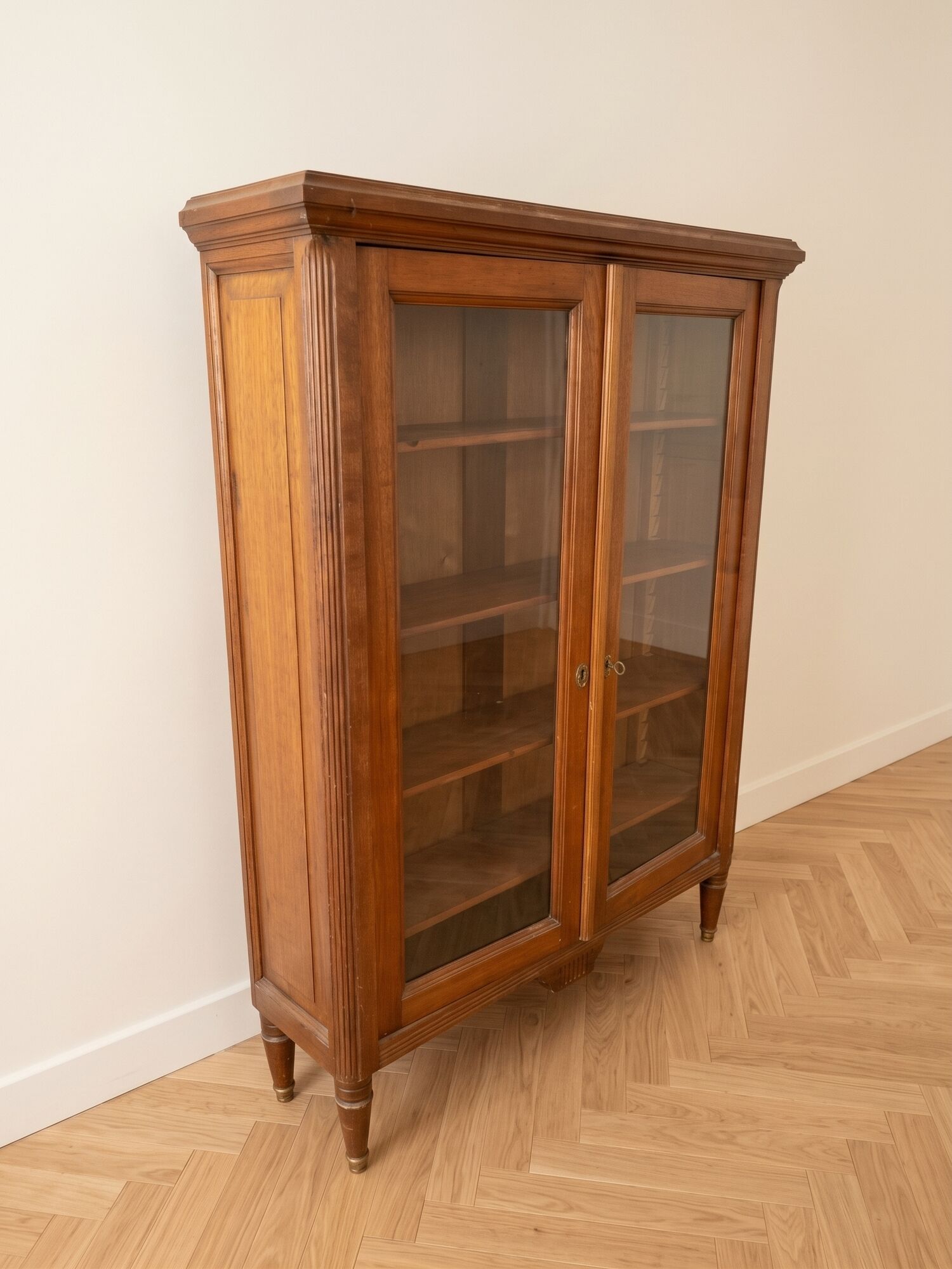 Small antique wooden glass-fronted bookcase