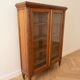 Small antique wooden glass-fronted bookcase