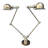 Unique double two-arm polished Jielde table lamp