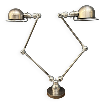 Unique double two-arm polished Jielde table lamp