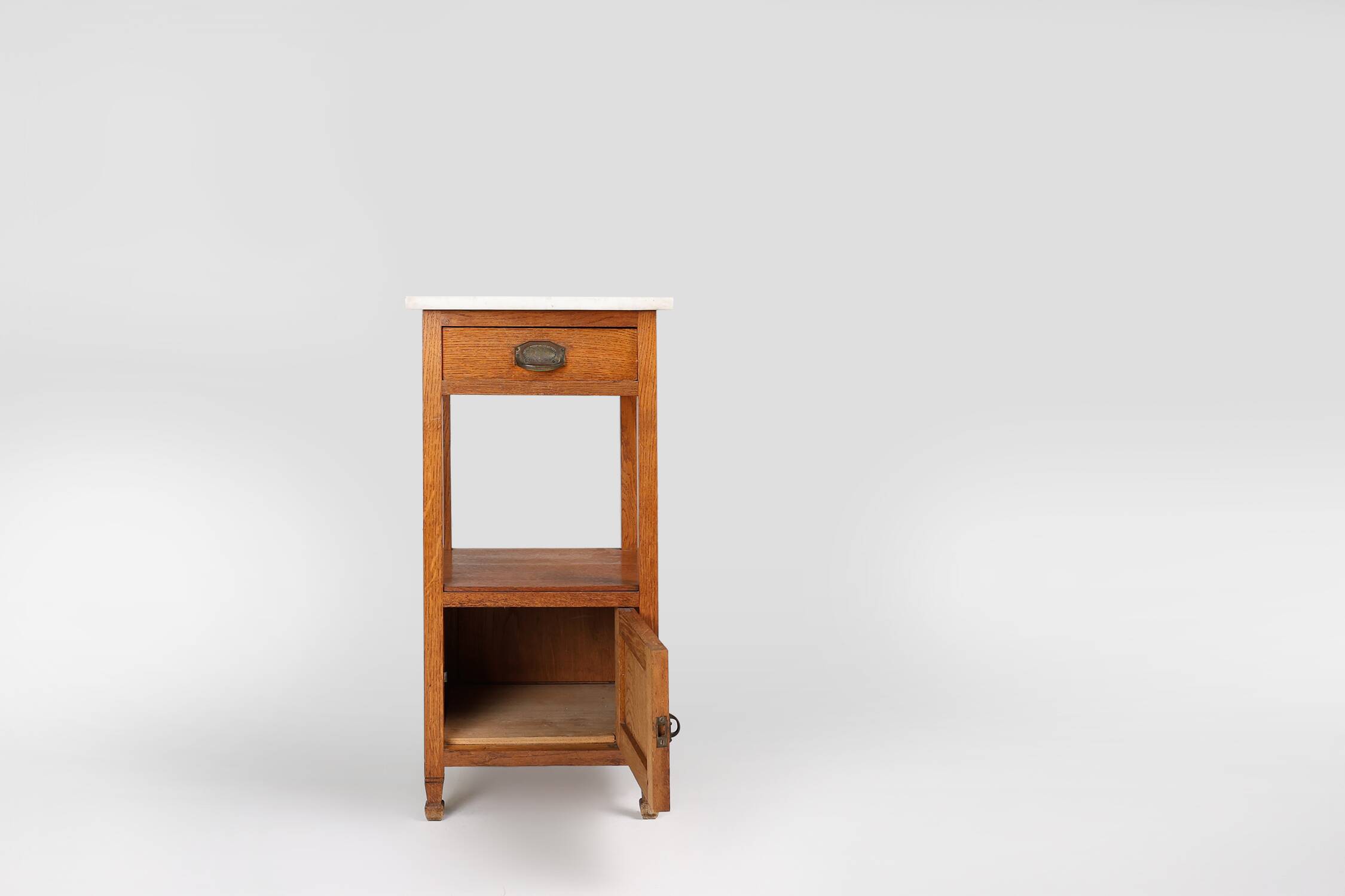 French Art Deco bedside table with a Carrara marble top, circa 1920.