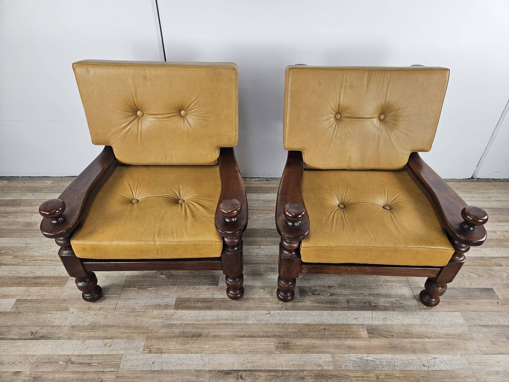1980s leather and solid wood armchairs