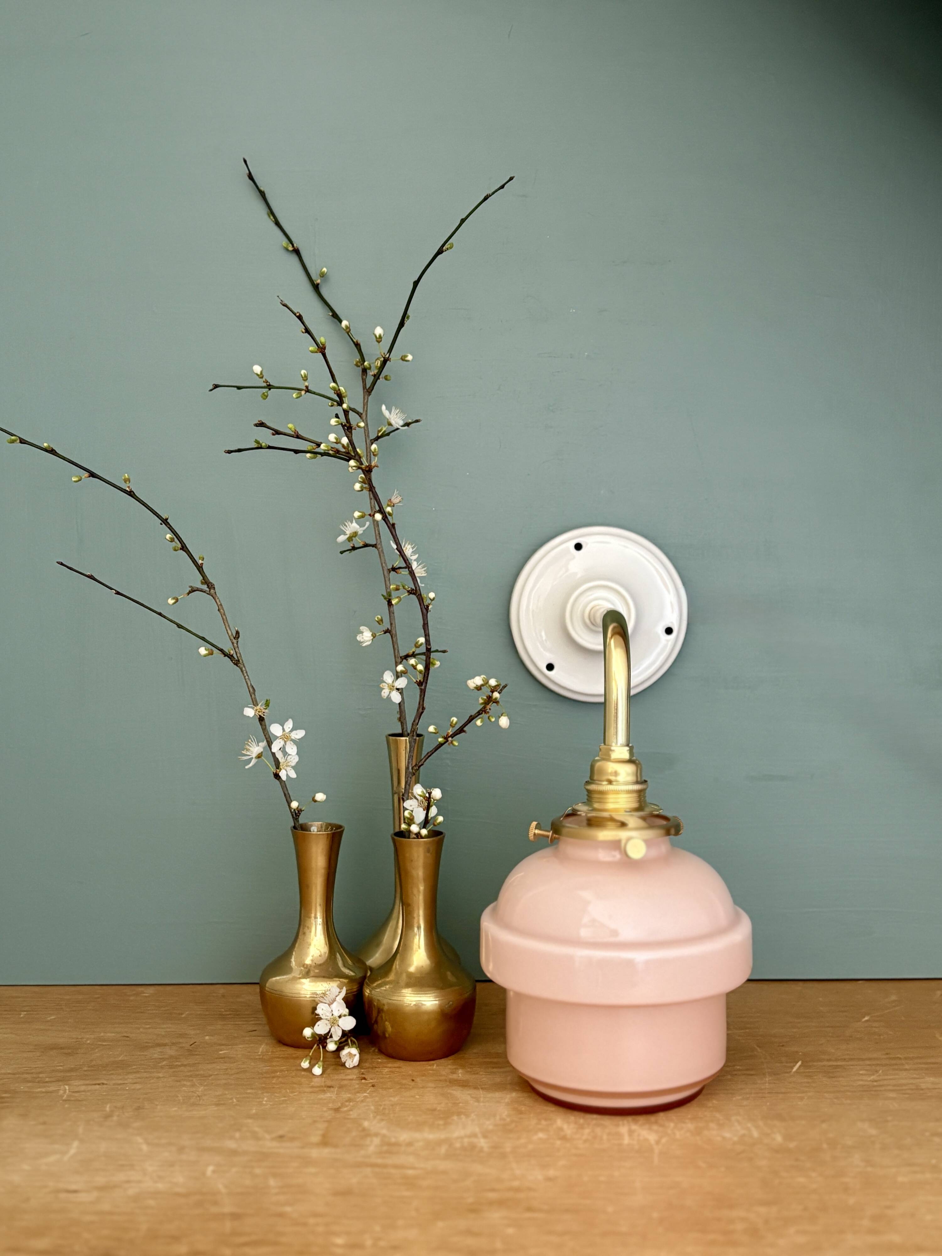 Vintage pink opaline globe wall light.