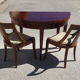 Half-moon console table, extendable in Empire style.
