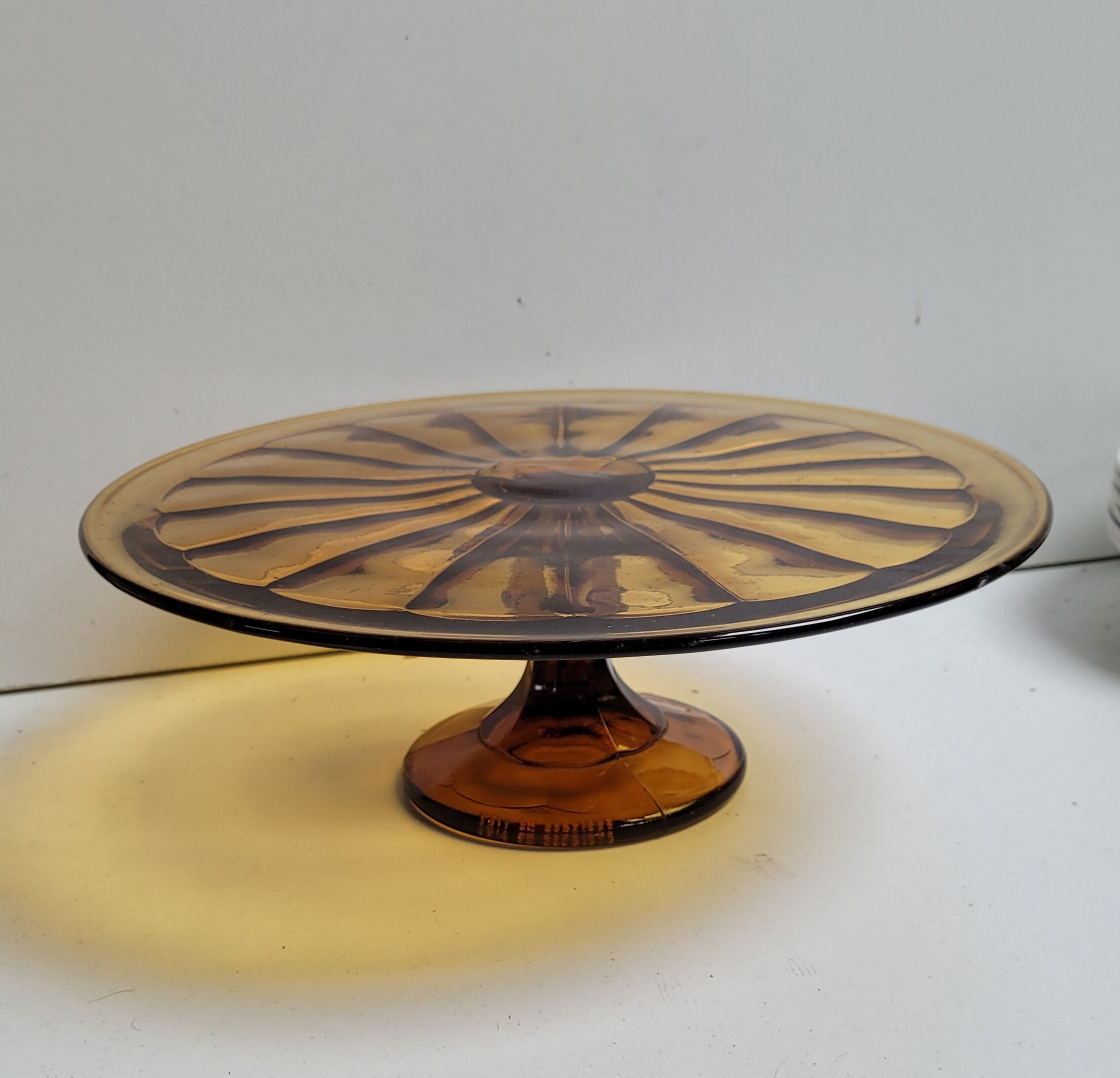 Brown molded glass pie cake dish