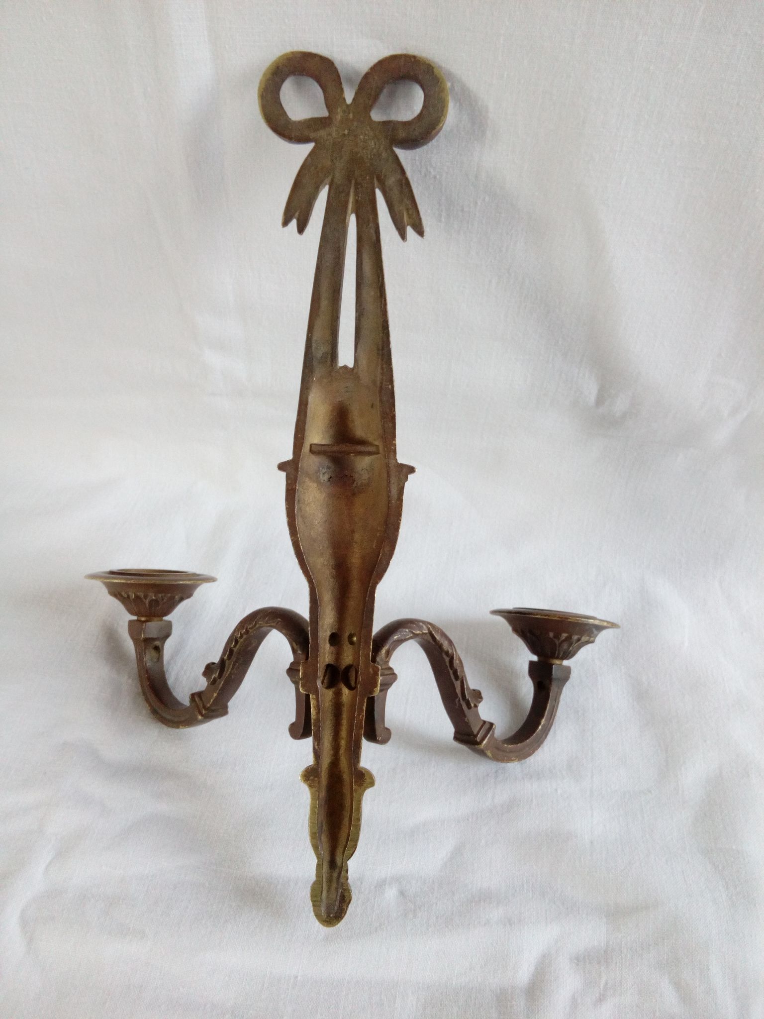 Applique en bronze patiné dans le style Louis XVI ruban