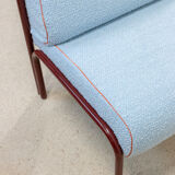 Souvignet armchair reupholstered in sky blue boucle.