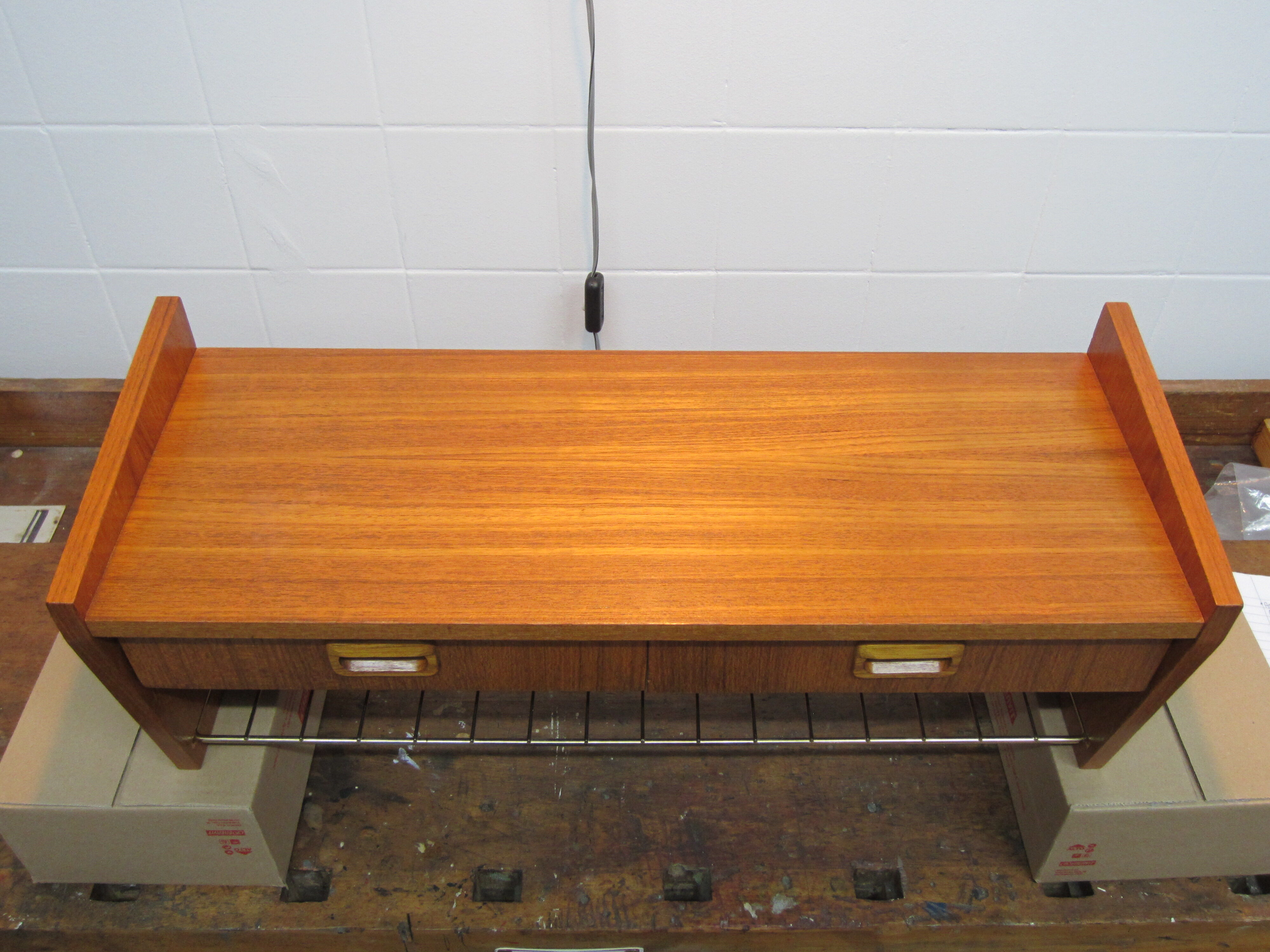 Scandinavian wall shelf in teak