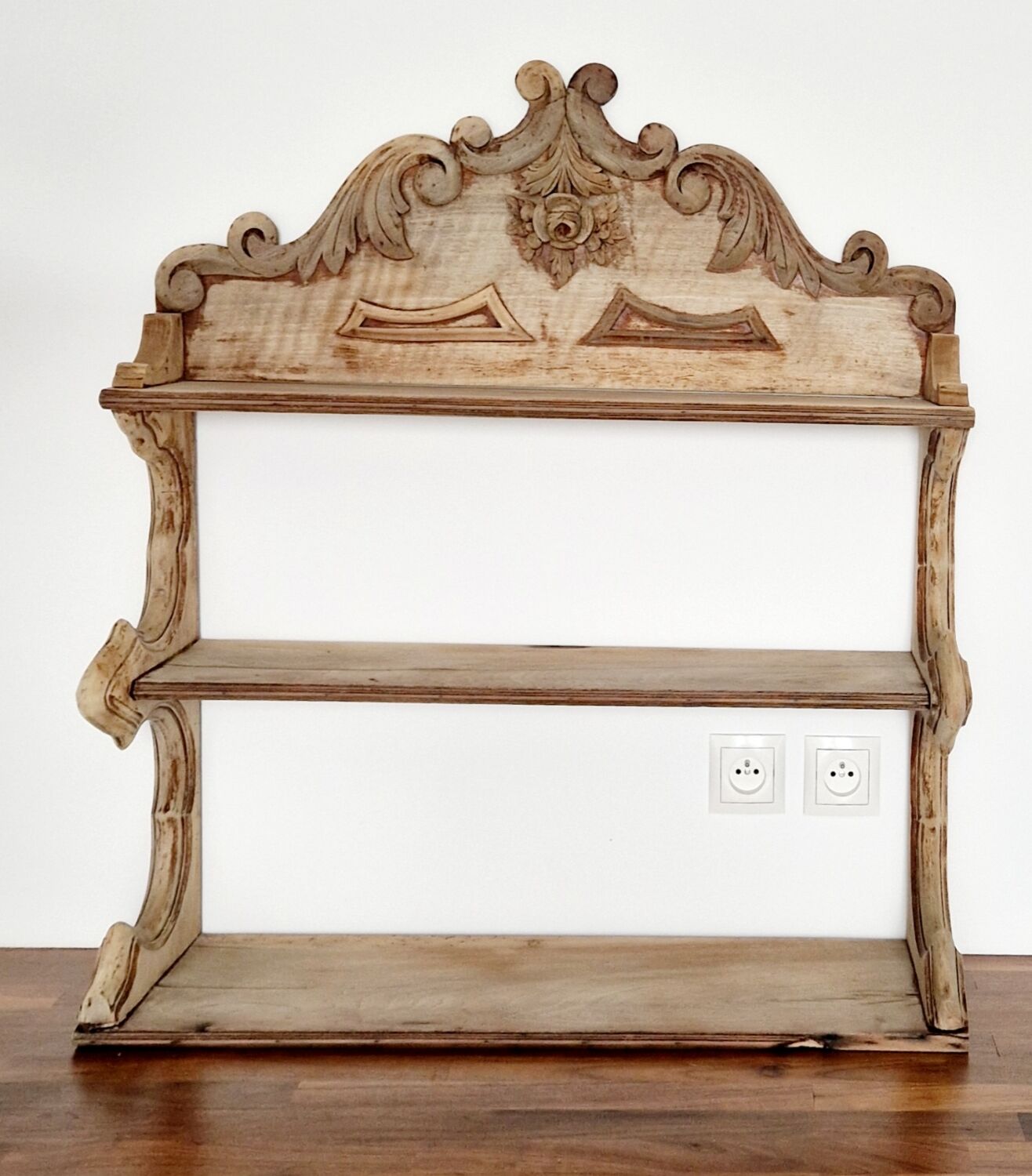 Old wall shelf carved in walnut