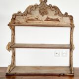 Old wall shelf carved in walnut