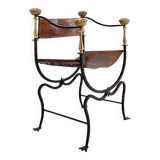Curule armchair in wrought iron and leather
