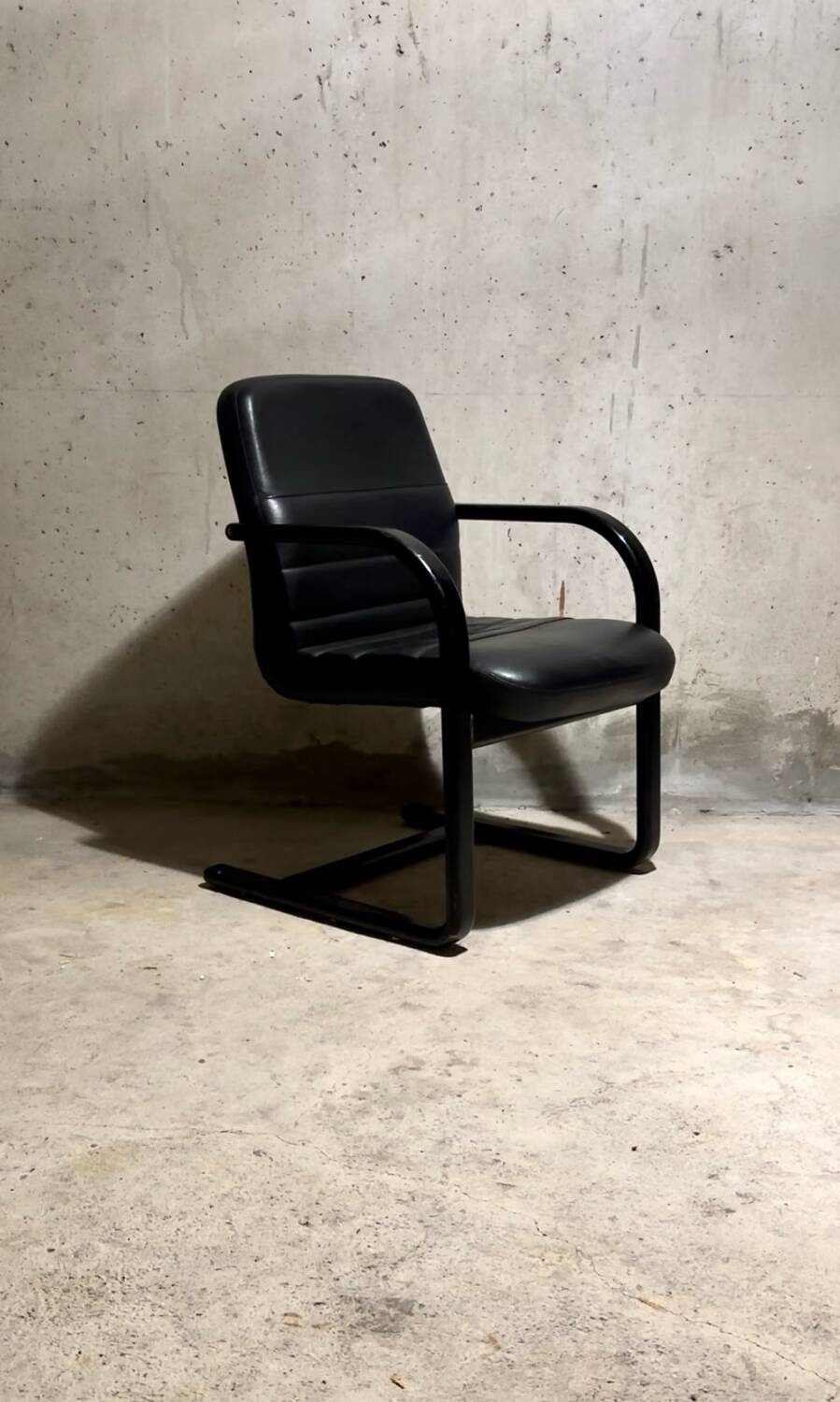 Vintage black leather armchair