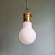 Large bulbous pendant light in white opaline and brass, 1960s.