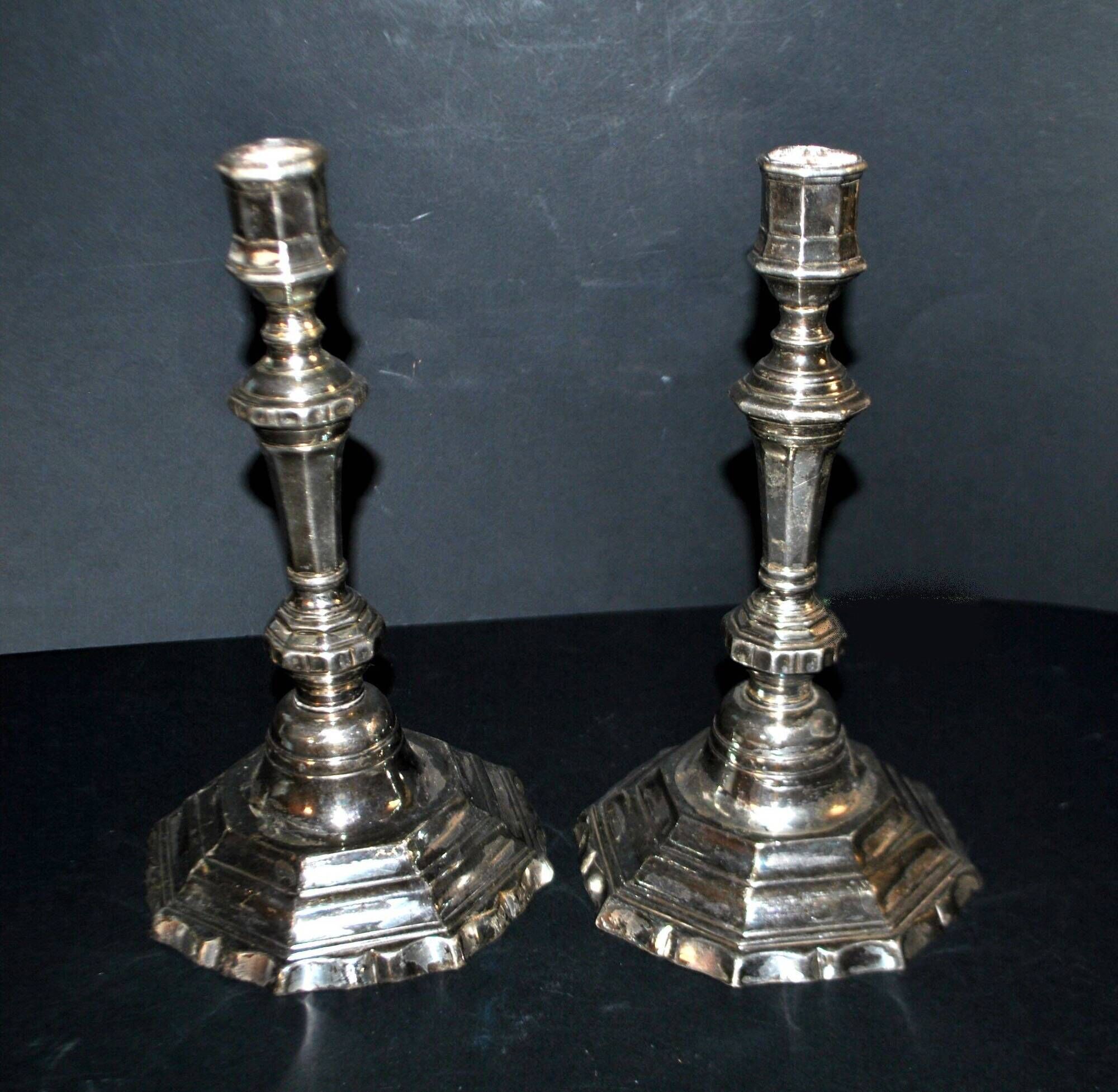 Pair of antique octagonal candlesticks in silvered bronze, Regency style.