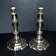 Pair of antique octagonal candlesticks in silvered bronze, Regency style.