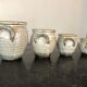 Set of 4 enamelled sandstone pots
