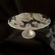 Fruit bowl, made of glass, with frosted decoration and base, luminous.