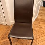 Many brown leather chairs "Roche Bobois"