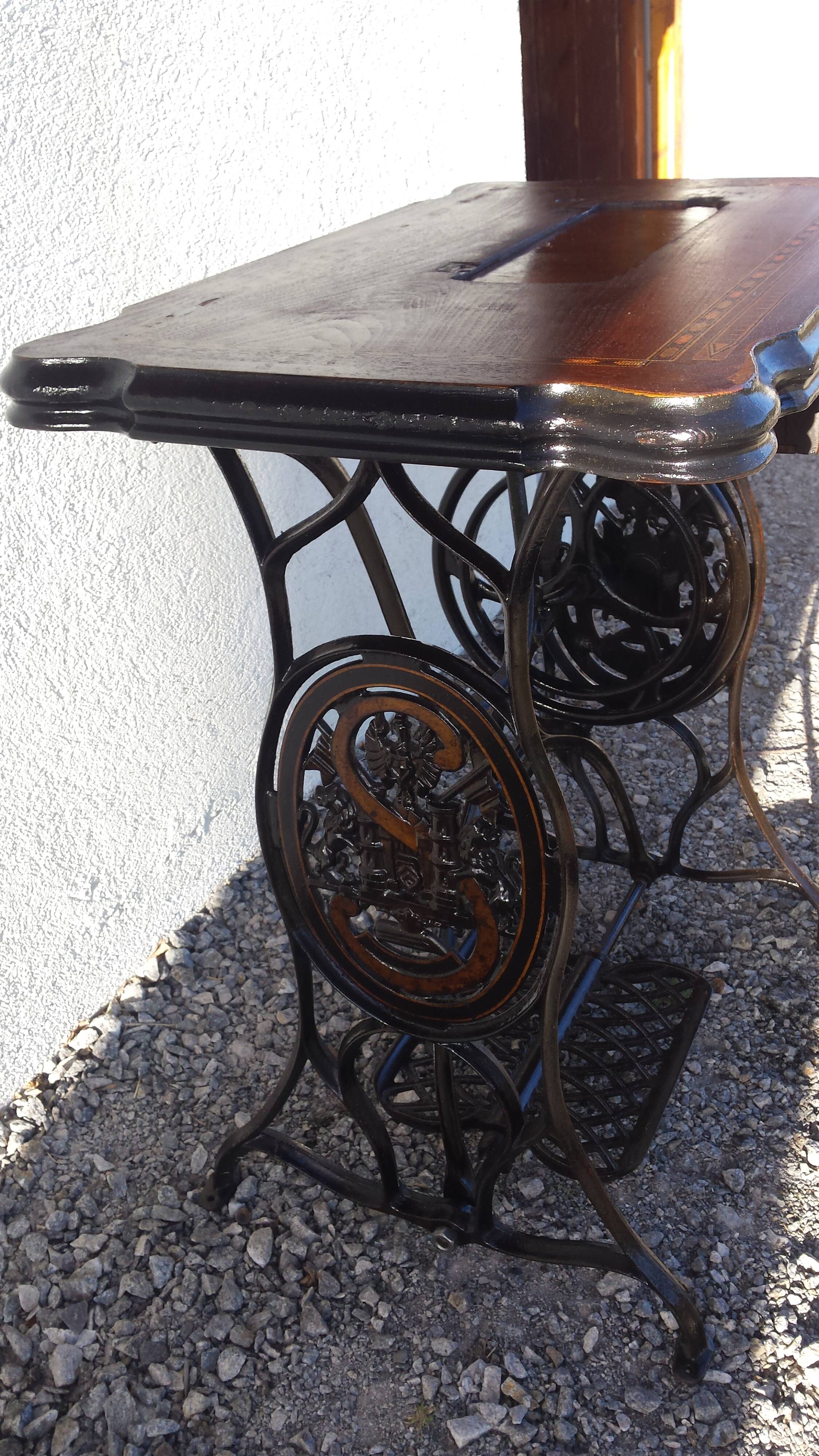 standing console of an old sewing machine