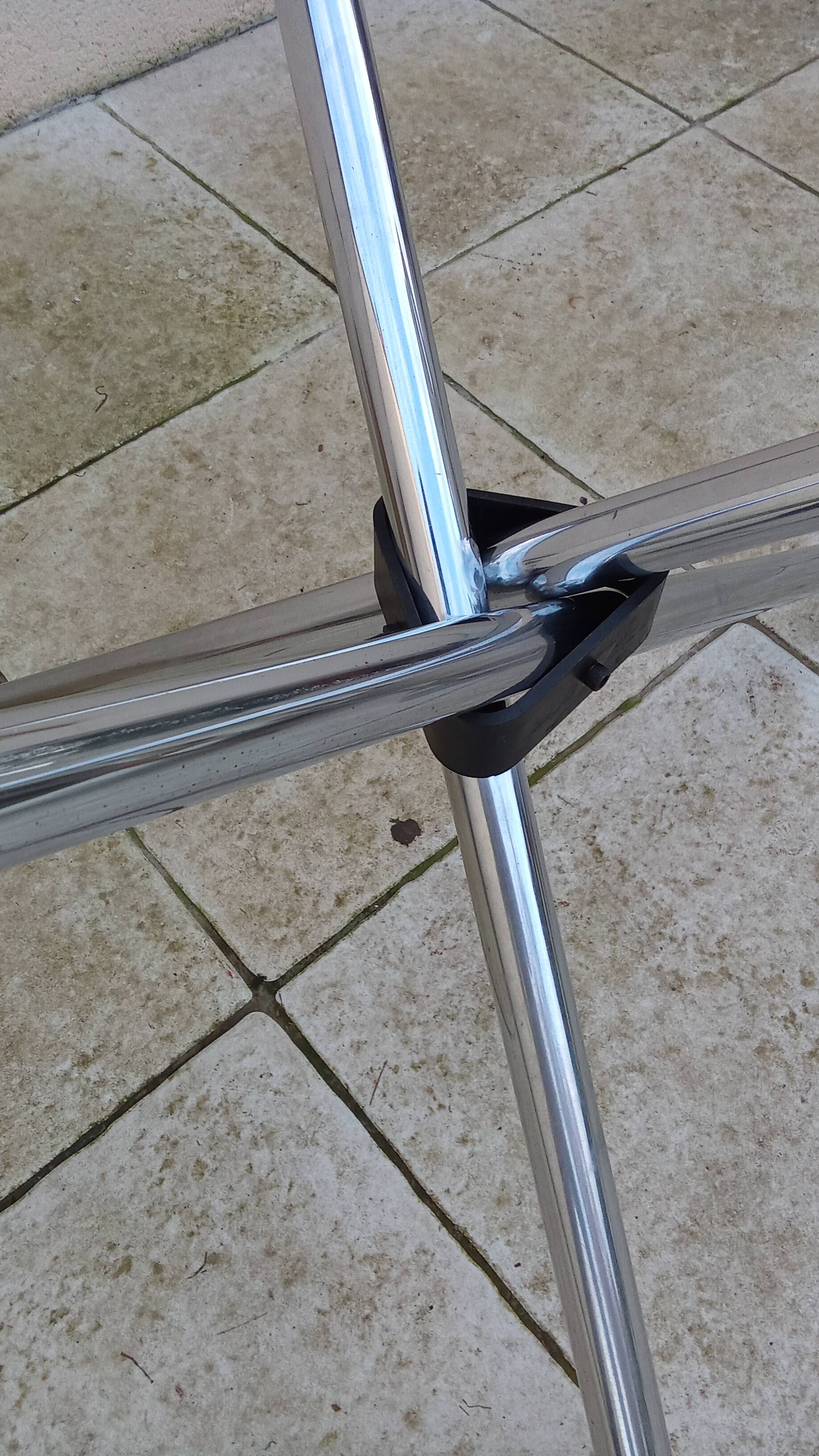 Vintage 70s table with glass and chrome legs.