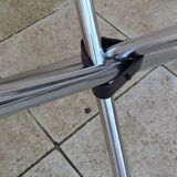 Vintage 70s table with glass and chrome legs.