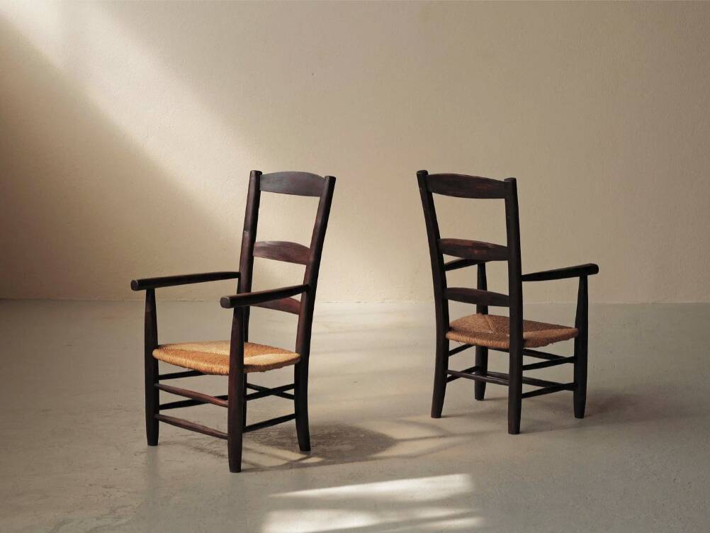 Pair of solid wood and straw armchairs, France, circa 1950.