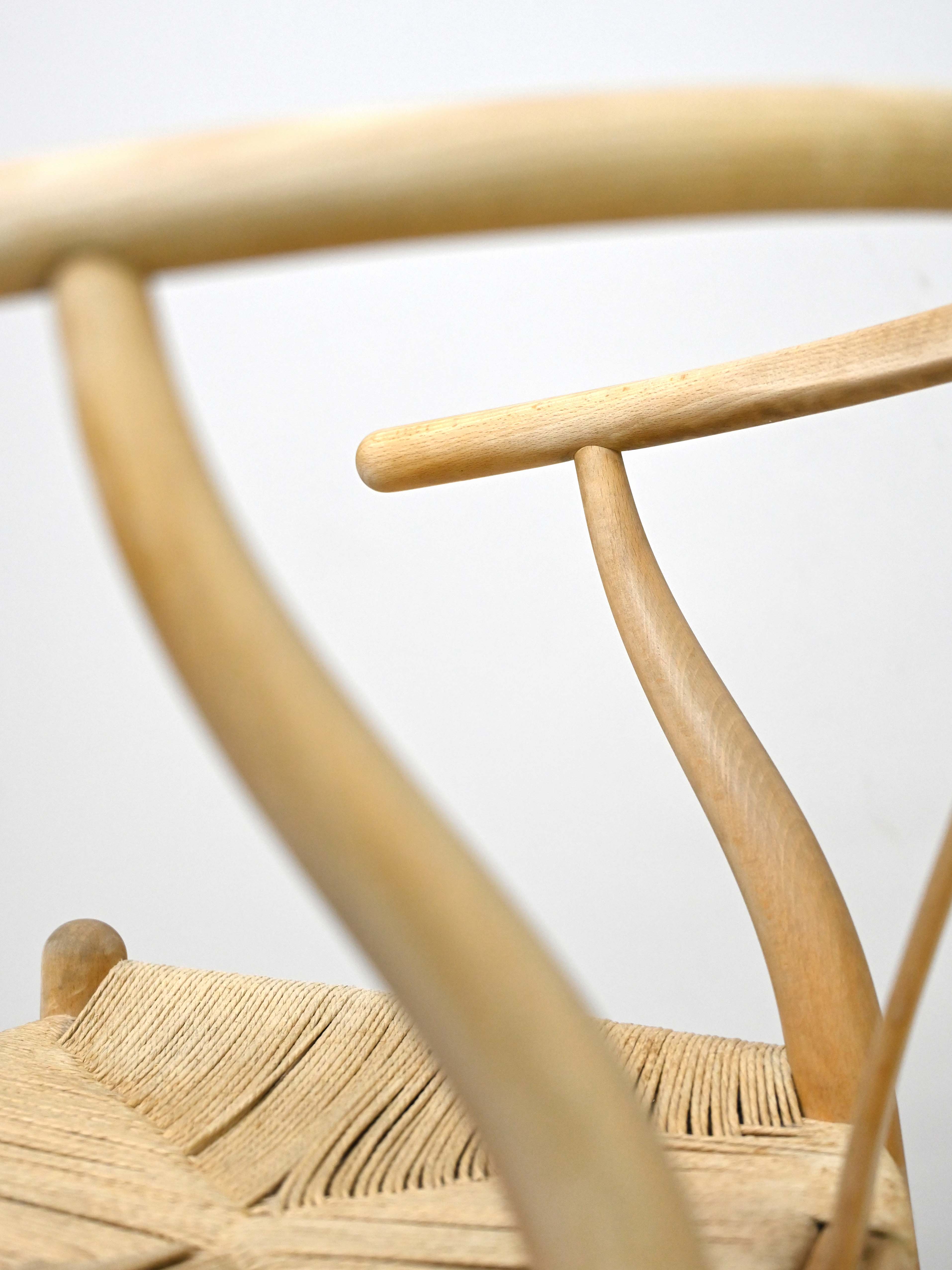 Set of six 'Wishbone chair' model chairs by Hans J. Wegner with leather cushions