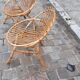 Pairs of shell rattan armchairs from the 50