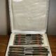 Set of 24 Bakelite stainless steel knives in box