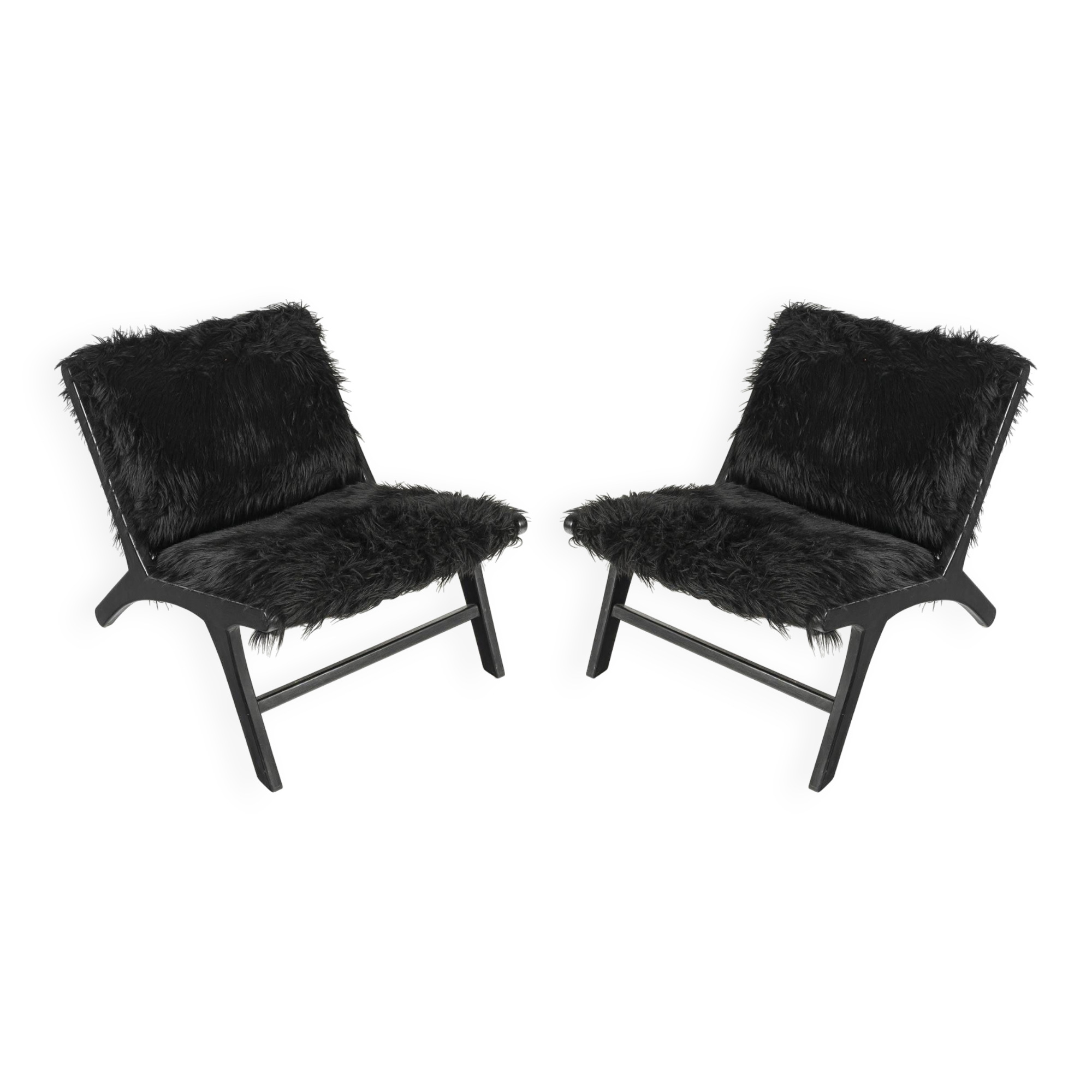 Pair of low chairs by olivier de schrijver