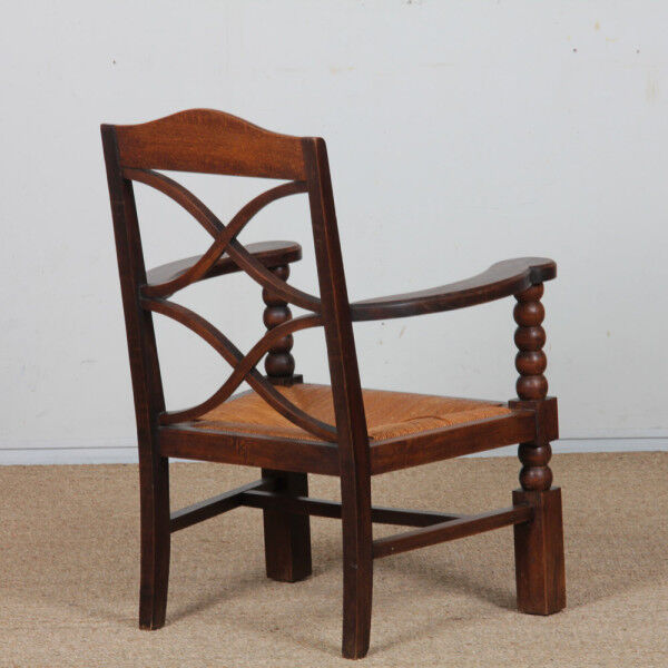 Pair of armchairs in the style of Charles Dudouyt, 1950.
