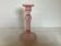 Old pink glass candlestick in Rosaline style.