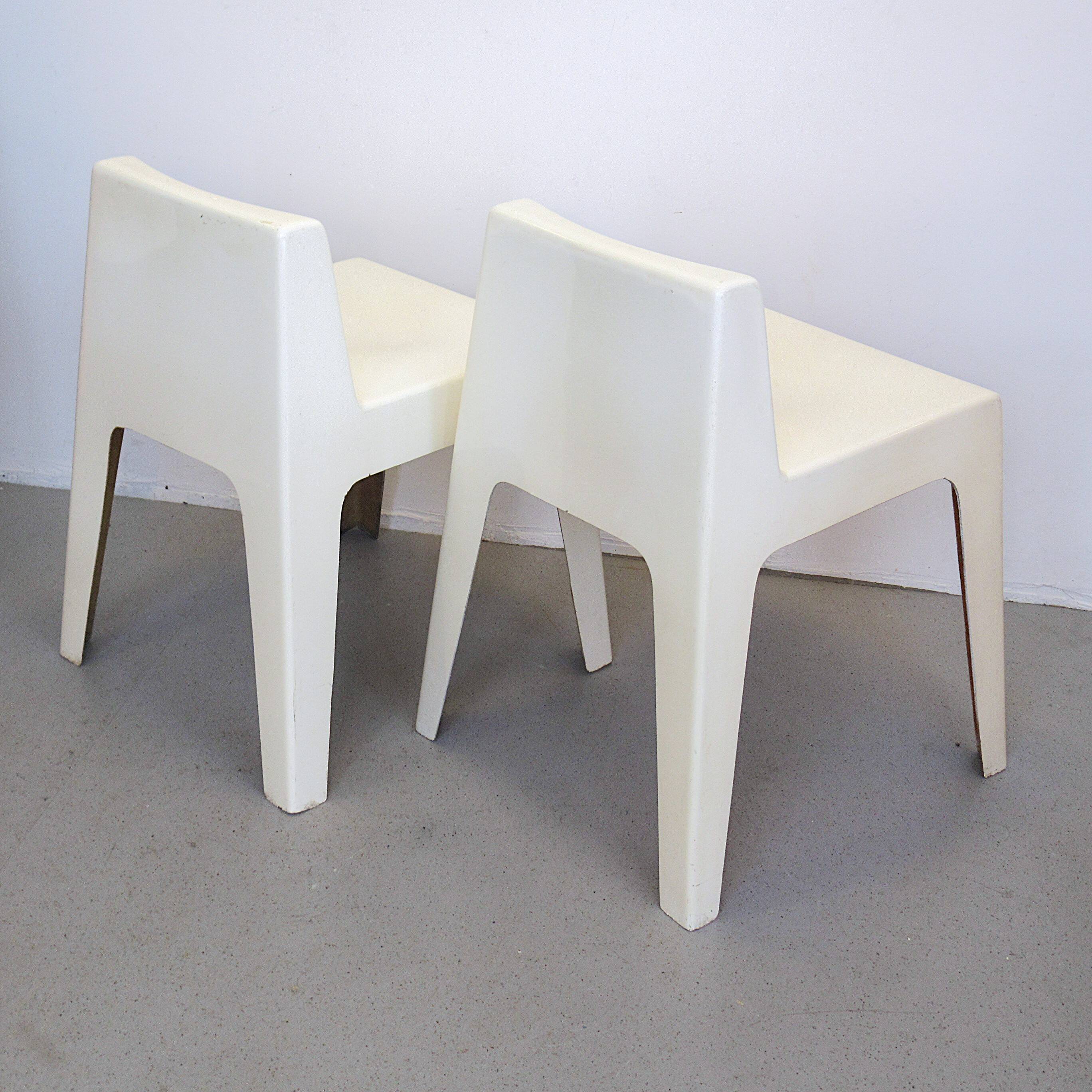 Two white fiberglass Kostka chairs 1970