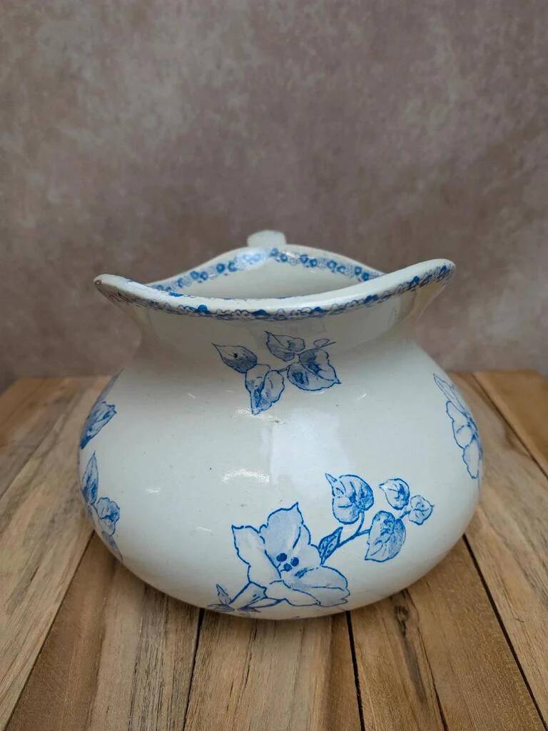 Small antique ironstone jug L.m Creil and Montereau with blue floral decoration.