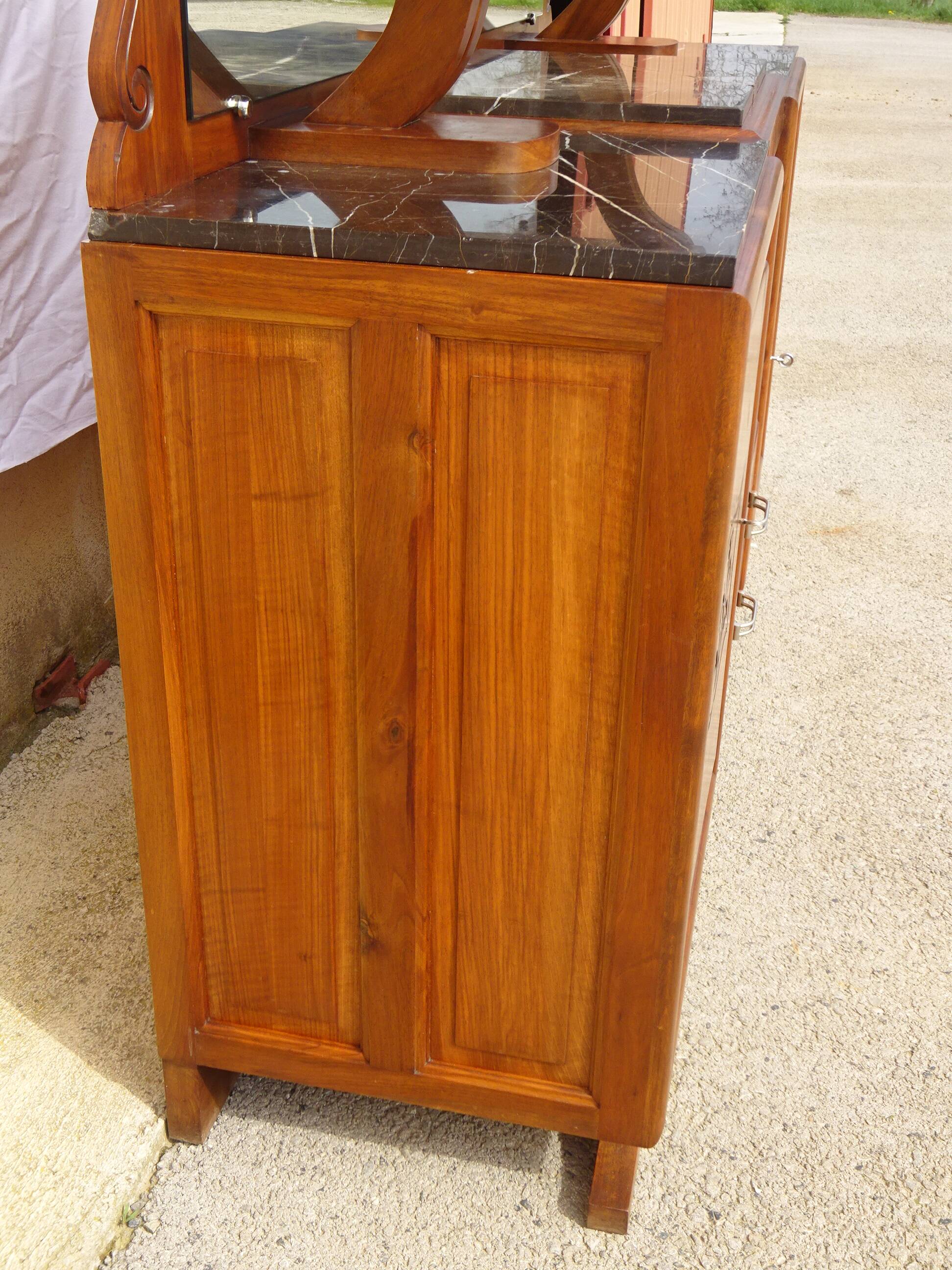 Solid walnut sideboard, moustache legs, black marble top.