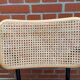 Chaise modèle Cesca conçue par Marcel Breuer avec accoudoirs à structure noire