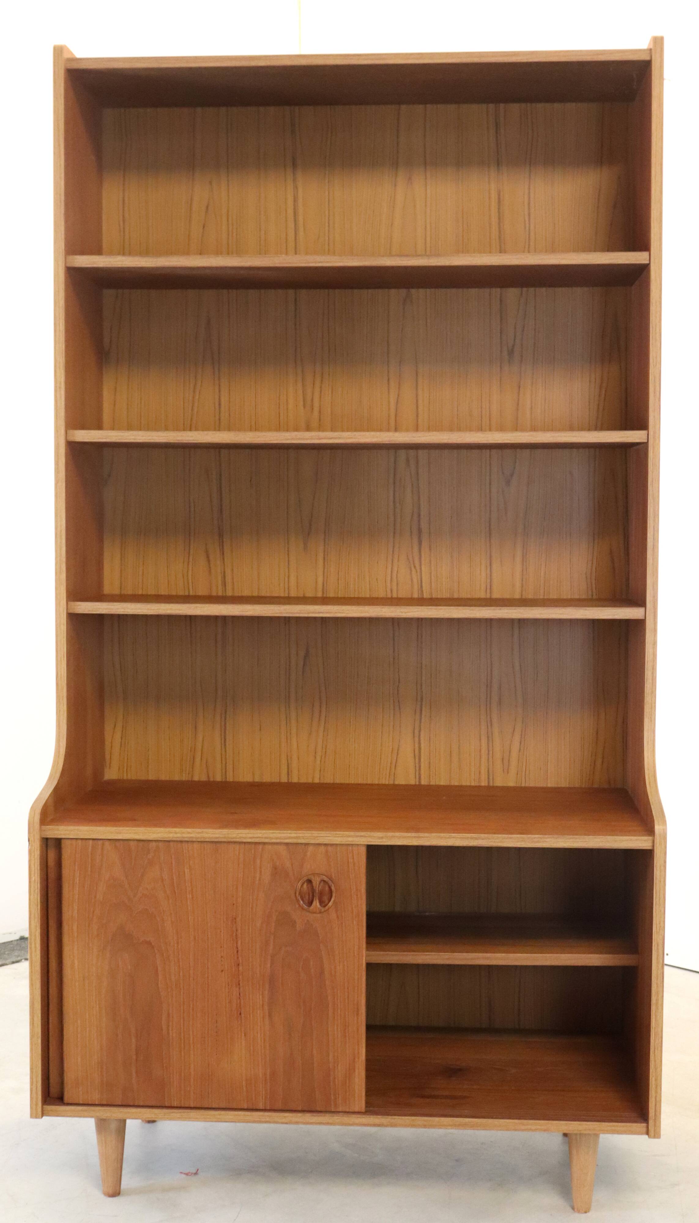 vintage bookcase with full on storage space.