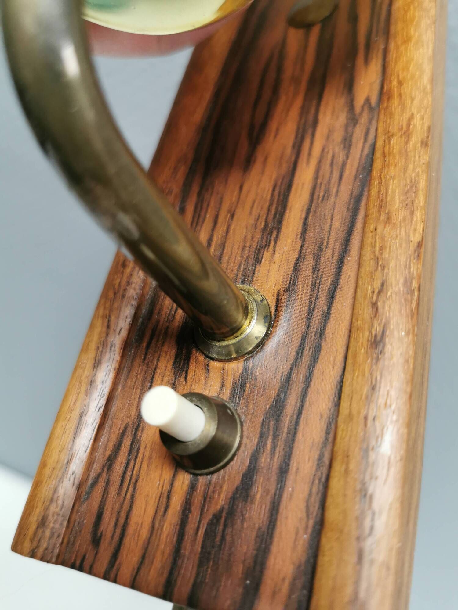 Small, stylish wall lamp with rosewood suspension and hard pressed glass