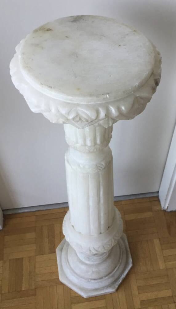 Carved marble pedestal