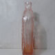 old carafe in orange pink glass