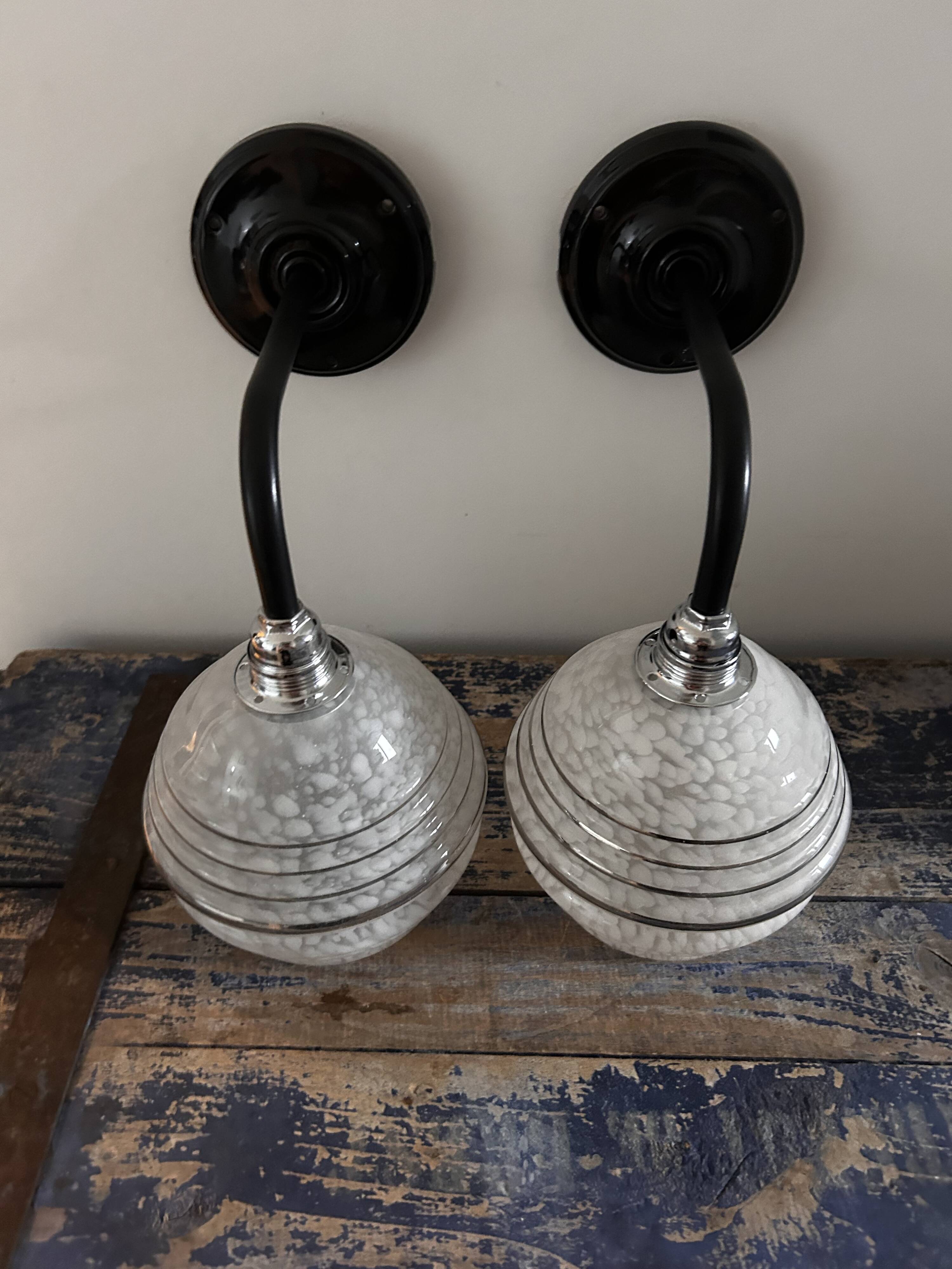 Pair of white, black and silver Art Deco wall lights
