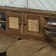 Vintage oak sideboard TV unit with raw finish and caning.